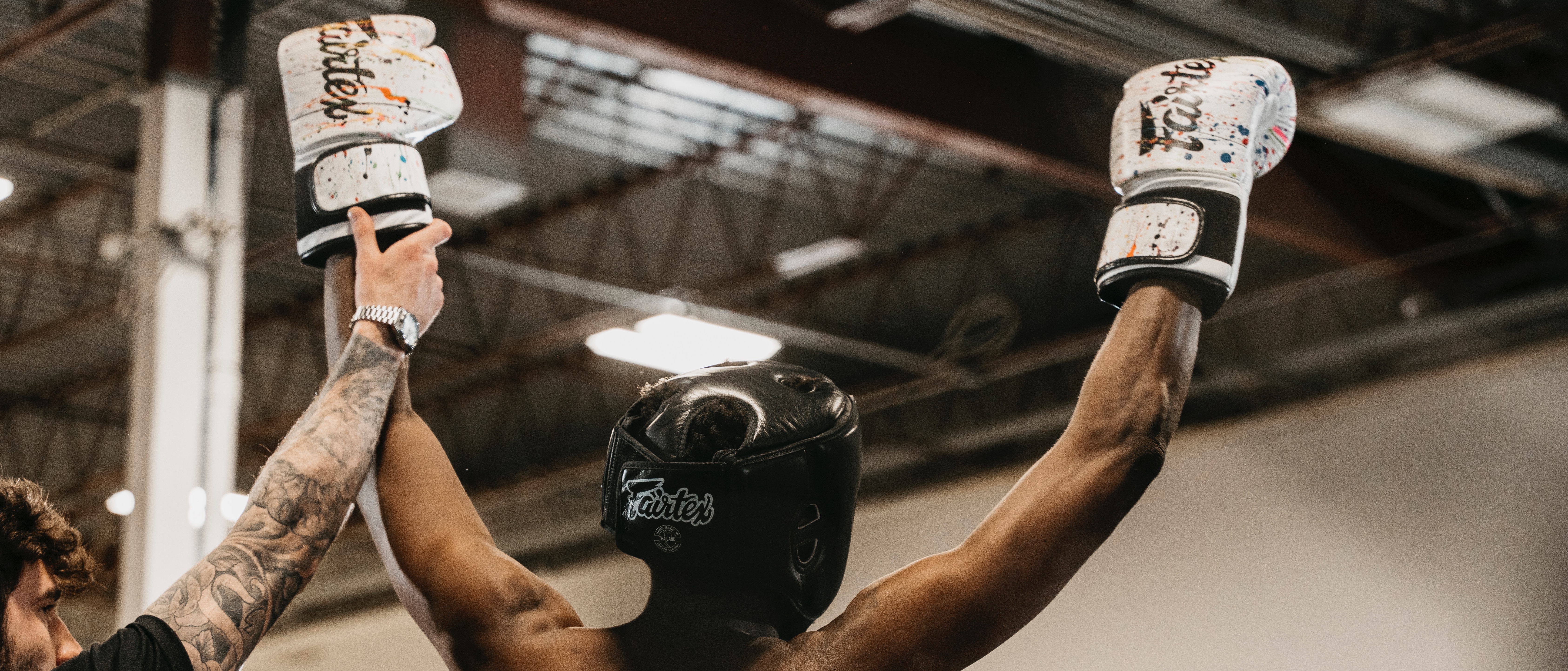 Fighter with hand raised